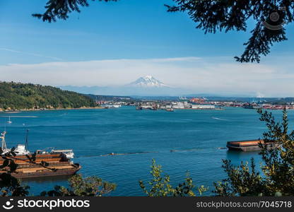 A view of the Port of Tacoma with Mount Rainier in the distance.