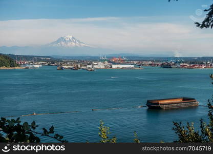 A view of the Port of Tacoma with Mount Rainier in the distance.