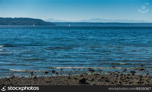 A view of the Puget Sound with the Olympic Mountains in the distance.