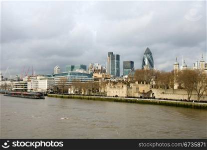 A view of the River Thames and city buildings, London, England