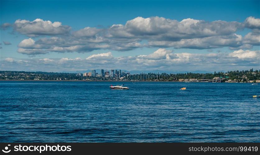 A view of the skyline in Bellevuie, Washington. Lake Washington in the foreground.