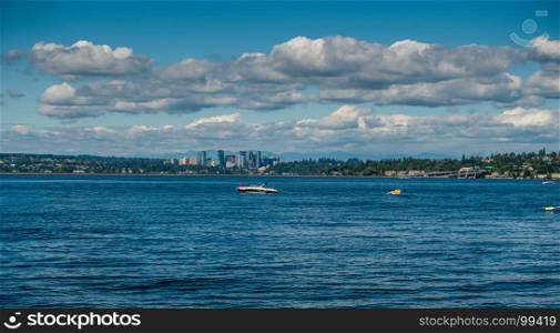 A view of the skyline in Bellevuie, Washington. Lake Washington in the foreground.