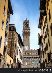 a view of the tower of Palazzo Vecchio in Florence, Italy