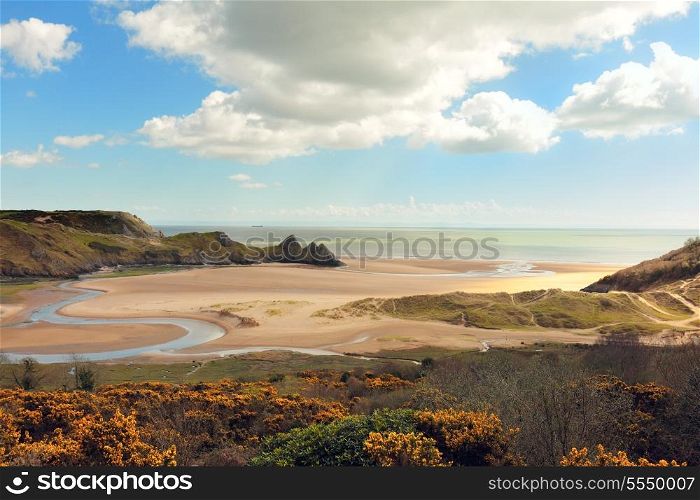 A view of Three Cliffs Bay on the Gower Peninsula in South Wales, UK