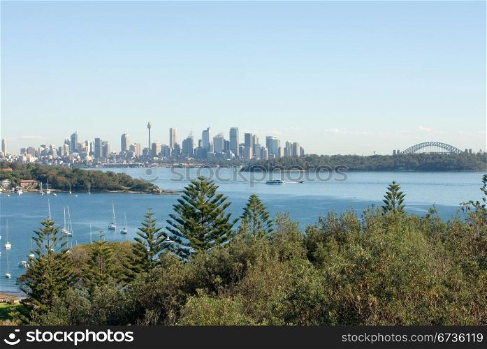 A view of Watsons Bay, and the distant skycrapers of Sydney&rsquo; CBD