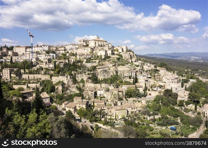 A viewpoint showing the small town of Gordes built on a hill in the Luberon area of Provence in Southern France.