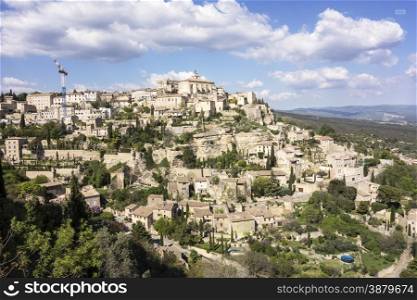 A viewpoint showing the small town of Gordes built on a hill in the Luberon area of Provence in Southern France.