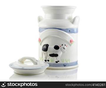 a vintage milk jug on white background