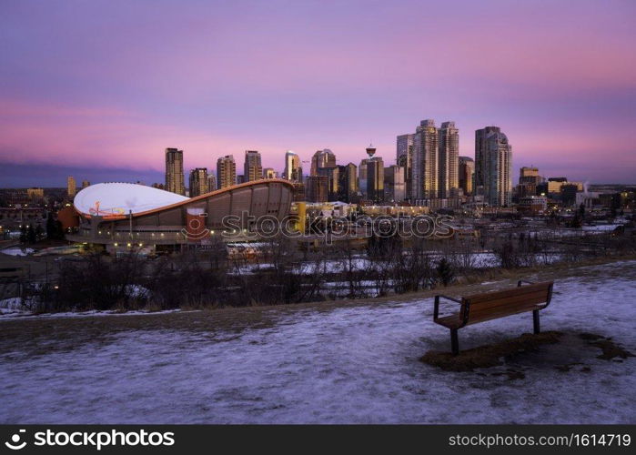 A vivid winter sunrise looking out over the skyline of Calgary in Alberta, Canada