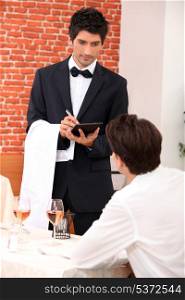 a waiter working at restaurant