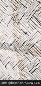a wall build on wicker bamboo like abstract vintage surface