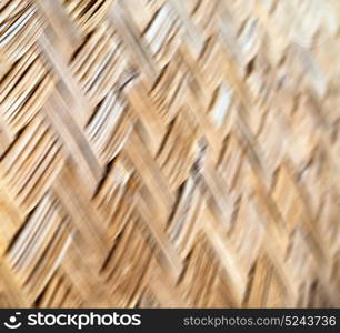 a wall build on wicker bamboo like abstract vintage surface