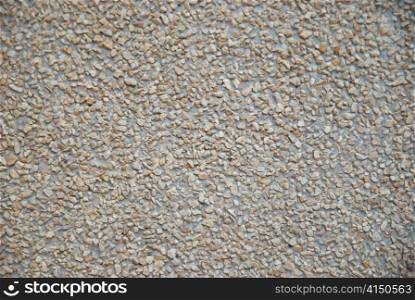 A wall of textured natural stones.