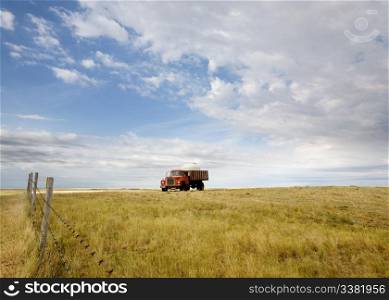 A water truck on the prairie
