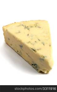 A wedge of British Stilton cheese