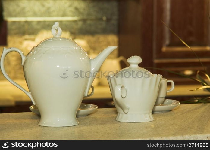 A white ceramic tea set