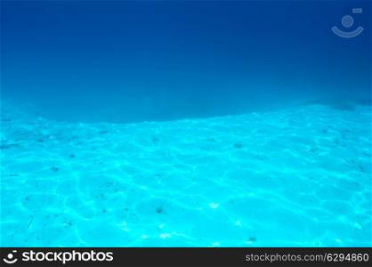 A white sand bottom in clear water at Maldives