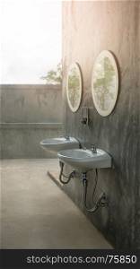 a white sinks and a stylish mirror. white sinks and mirror