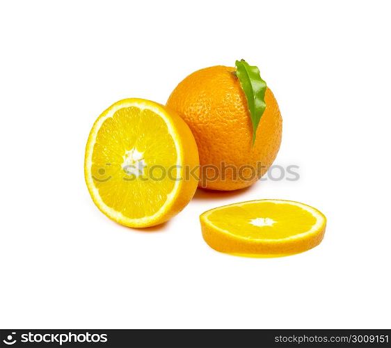 A whole orange, half an orange and a cut slice are lying on a white background