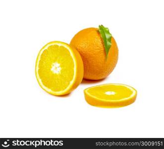 A whole orange, half an orange and a cut slice are lying on a white background