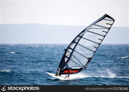 A wind surfer on the ocean