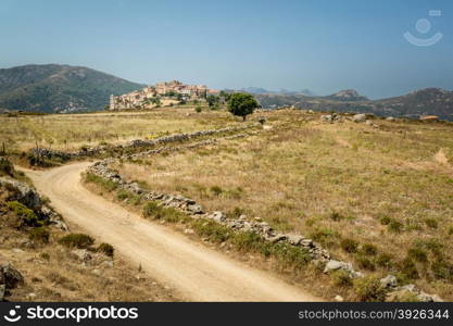 A winding dirt track leads to the picturesque village of Sant&rsquo;Antonino in the Balagne region of Corsica