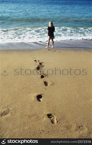 A woman&acute;s footprints imprinted on the sand, Pigeon Point Beach, Tobago, Caribbean