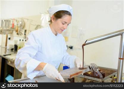 a woman and chocolate bake chef