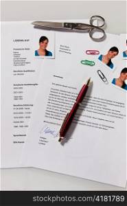 a woman applies for a vacant position in the labor market. application portfolio and cv