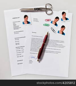 a woman applies for a vacant position in the labor market. application portfolio and cv