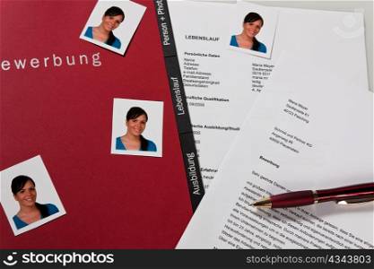 a woman applies for a vacant position in the labor market. application portfolio and cv