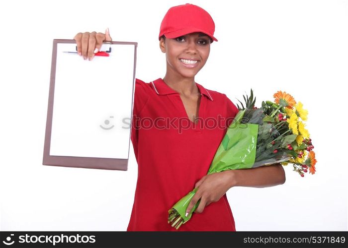 A woman delivering flowers.