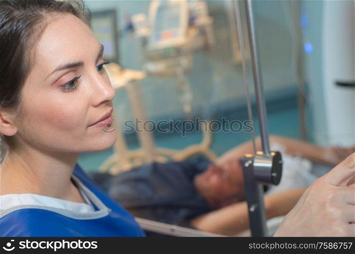 a woman doctor checking screen