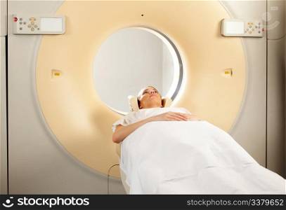 A woman having a CT Scan taken