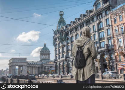 A woman in a hijab walks in St. Petersburg