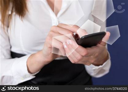 A Woman in a white blouse using a mobile phone