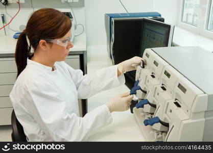 a woman in laboratory research. research in the research laboratory.