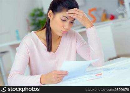 a woman is experiencing money problems