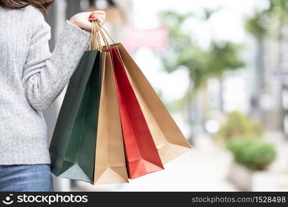 A woman is shopping at the mall