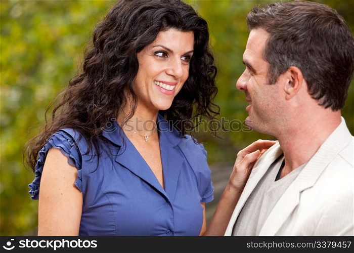 A woman looking happy at her husband / boyfriend - Focus on the woman