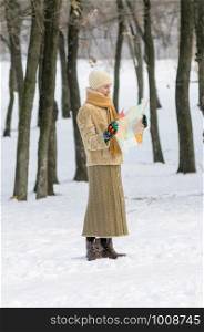 A woman lost in the forest in winter