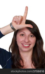 A woman making the loser sign with her hand