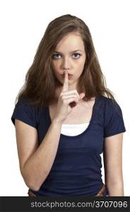 A woman saying be quiet by saying shhh