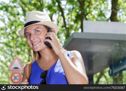a woman talking on smartphone