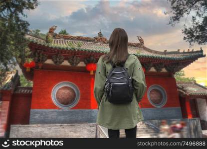 a woman walks around the Shaolin monastery. China