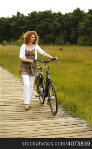 A woman with a bike