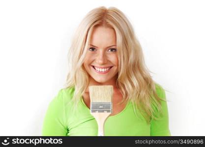 a woman with a brush against the wall