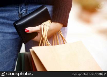 A woman with a wallet Ready for online shopping