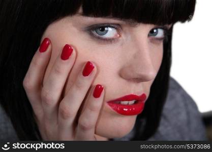 A woman with painted nails