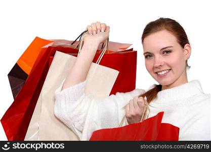 A woman with plenty of shopping bags.